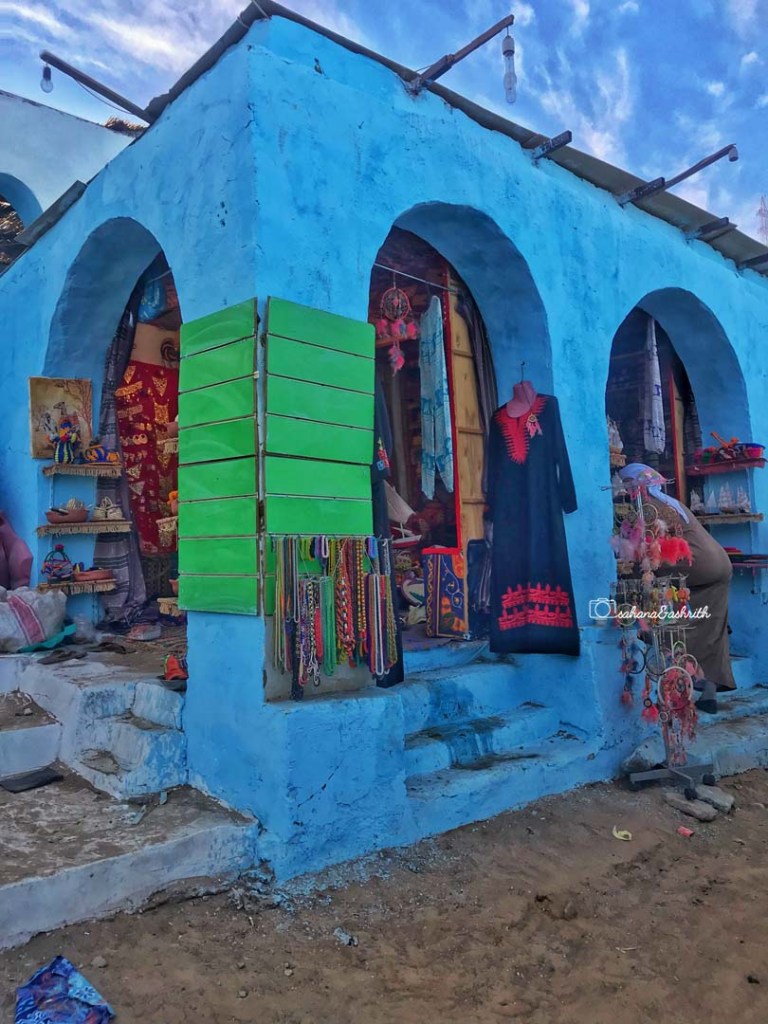 Blue wall and Nubian village with Blue Jalebiya