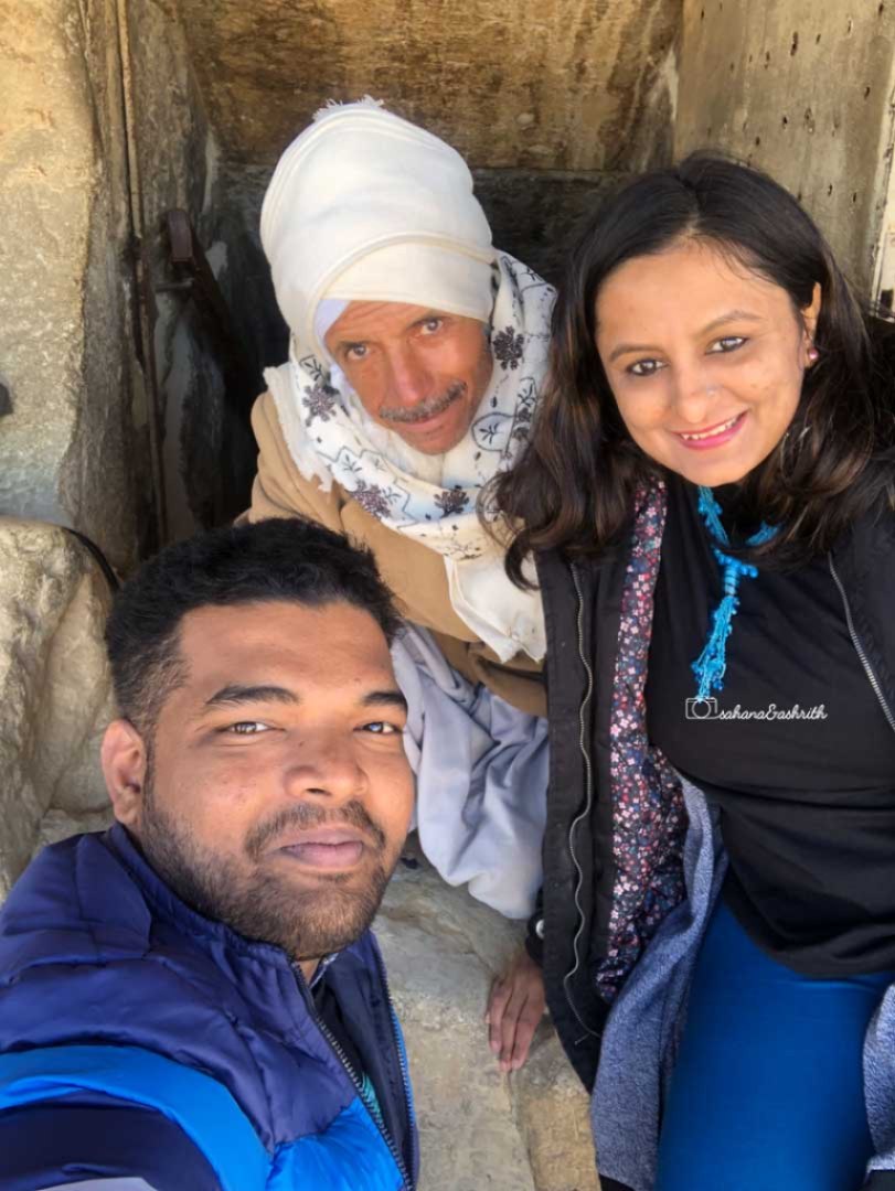 Egyptian old man with Indian couple travellers