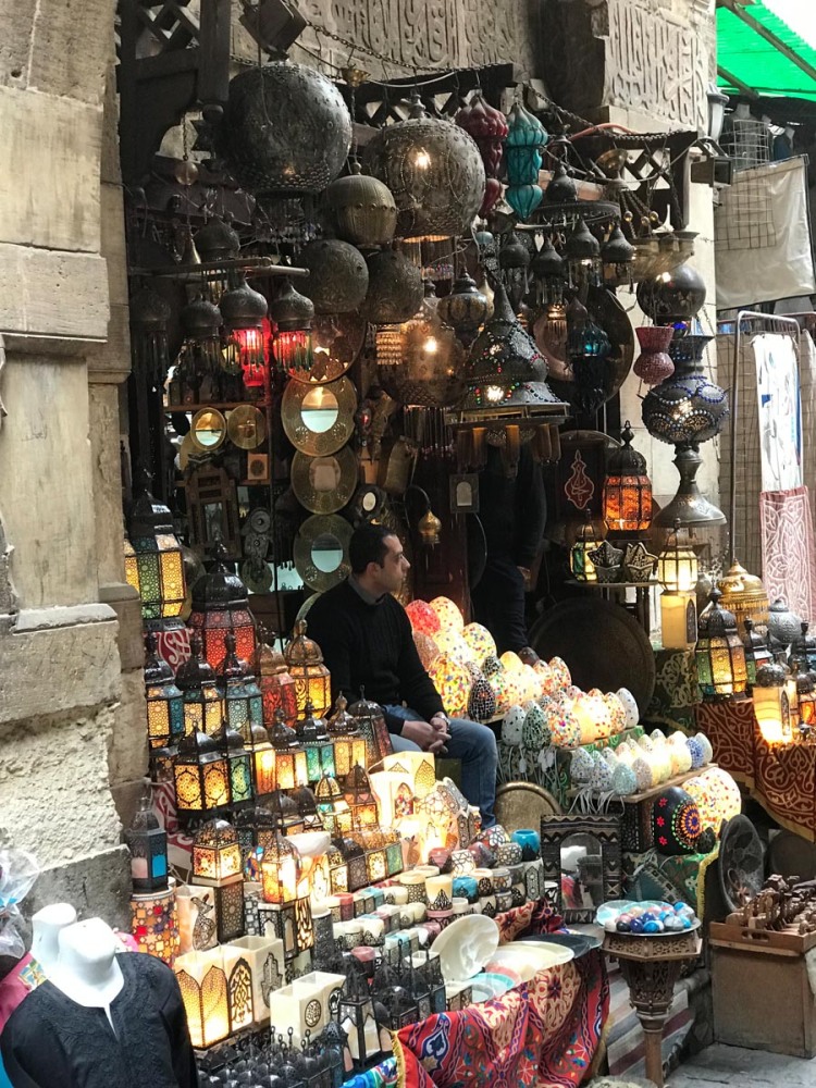 AnEgyptian awaiting hs customers  in his lamp shop at Cairo's old market