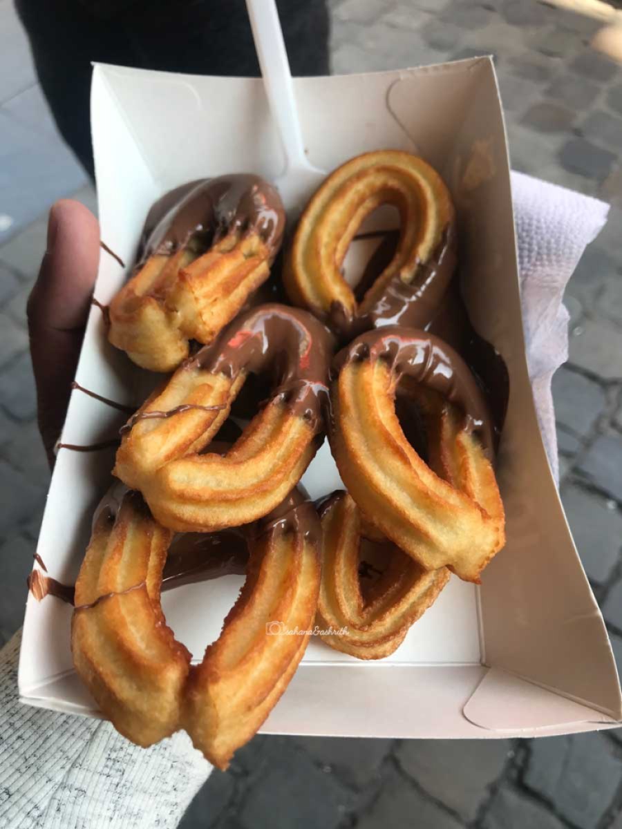 Churros with chocolate sauce in Brussels