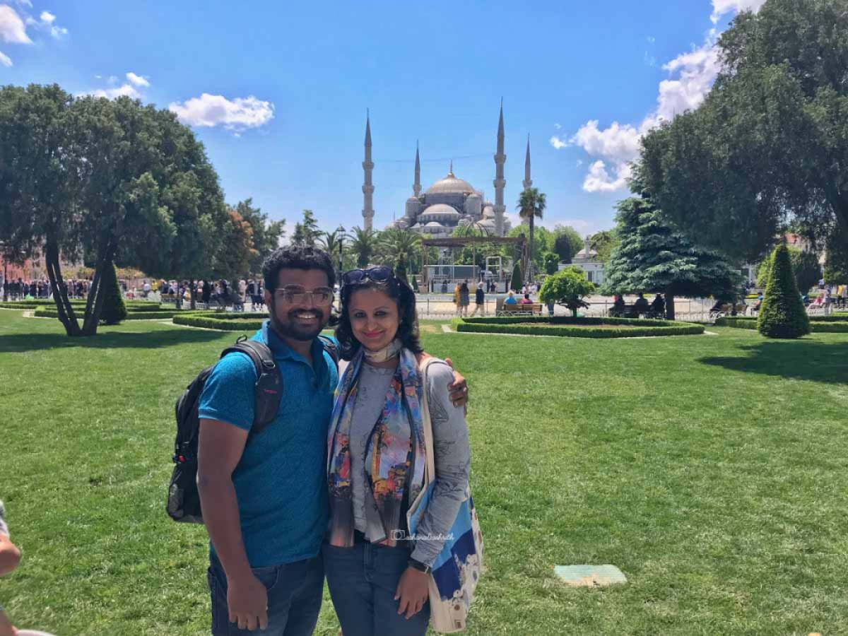 Indian travellers wearing smart casuals in Sultan Ahmet square at Istanbul