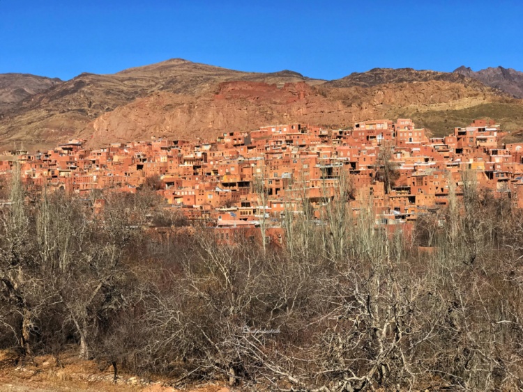 View of Abyaneh red adbove village from mountain