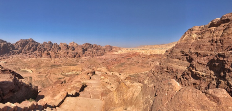 Valley full of hiking trails and brown mountains in Jordan