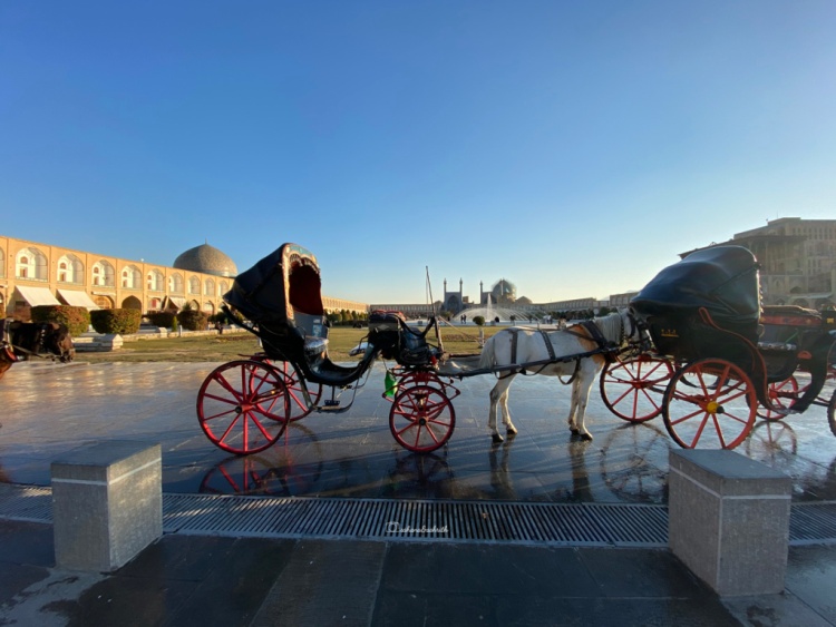 Horse chariots standing in front of world's second largest public square at Isfahan