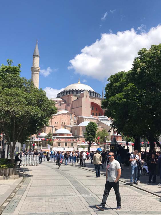 Turkish men in smart casuals in front of Hagia Sophia