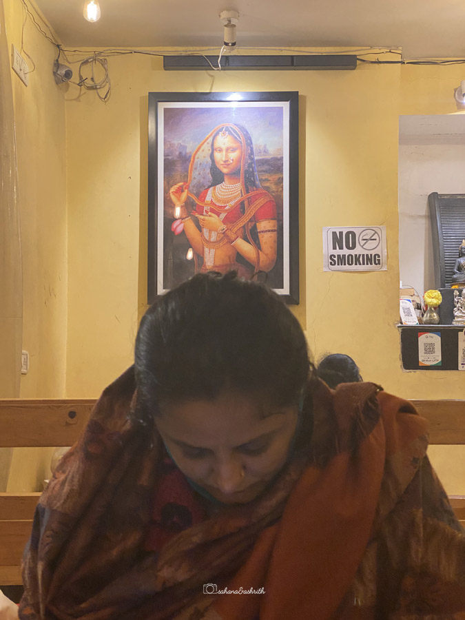 Indianised Monalisa in the background at cafe in Varanasi