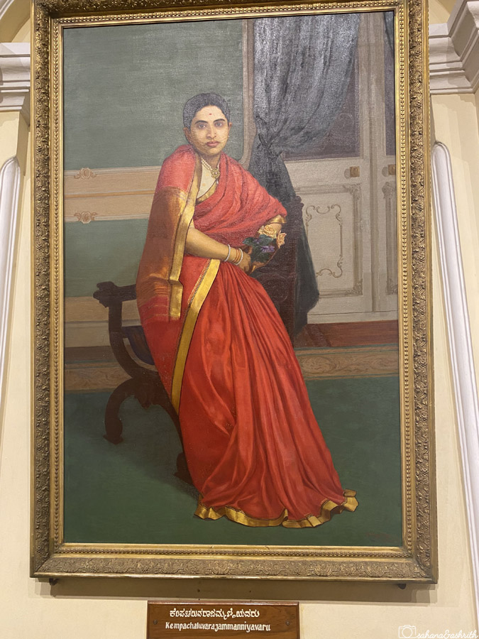 Painting of Mysore queen in a red saree