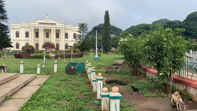 Colonial building surrounded by garden